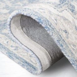 Safavieh Blue & Ivory Traditional Hand Woven Wool Area Rug -Famous Furniture Store blue and ivory traditional hand woven wool area rug rugs the well appointed house 9 de329b65 48ef 47ed 8784 dd9b6df064e4