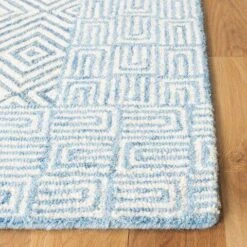 Safavieh Blue & White Hand Tufted Geometric Patterned Wool Area Rug -Famous Furniture Store blue and white hand tufted geometric patterned wool area rug rugs the well appointed house 6