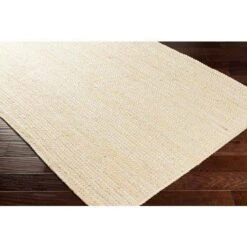 Cream Braided Jute Rug, Available In A Variety Of Sizes -Famous Furniture Store cream braided jute rug available in a variety of sizes rugs the well appointed house 5 2d46b01f 6bb8 4f7e ae98 c4a7ed6d50d1