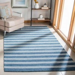Safavieh Deep Blue & Ivory Hand Tufted Striped Area Rug -Famous Furniture Store deep blue and ivory hand tufted striped area rug rugs the well appointed house 2 ce23a0b6 eb95 4388 a3fe 4502a94ee88e