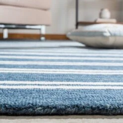 Safavieh Deep Blue & Ivory Hand Tufted Striped Area Rug -Famous Furniture Store deep blue and ivory hand tufted striped area rug rugs the well appointed house 6 61b59756 b296 47f1 911b 209faf7d63e5