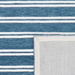 Safavieh Deep Blue & Ivory Hand Tufted Striped Area Rug -Famous Furniture Store deep blue and ivory hand tufted striped area rug rugs the well appointed house 7 518939f5 af6e 46a7 b705 05e84de3909c