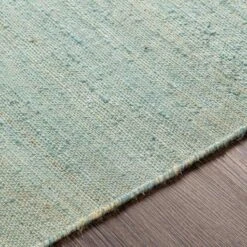 Evora Teal Hand Woven Jute Rug, Available In A Variety Of Sizes 8 Evora Teal Hand Woven Jute Rug, Available In A Variety Of Sizes -Famous Furniture Store evora teal hand woven jute rug available in a variety of sizes rugs the well appointed house 4 925bf2fa 1b84 4937 9f5a 7a95ff81ff4a