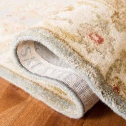 Safavieh Gray Blue & Beige Hand Tufted Floral Area Rug -Famous Furniture Store gray blue and beige hand tufted floral area rug rugs the well appointed house 11 c225d77e 8563 4c0a aec6 d1b3a7d1f31a