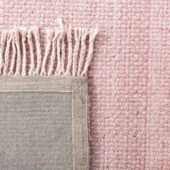 Safavieh Hand Loomed Pink Wool Area Rug 11 Safavieh Hand Loomed Pink Wool Area Rug -Famous Furniture Store hand loomed pink wool area rug rugs the well appointed house 5 20b5f488 45f0 4dc5 b6bb bc359b873f38