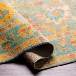 Hillcrest Teal & Gold Fringe Rug, Available In A Variety Of Sizes -Famous Furniture Store hillcrest teal and gold fringe rug available in a variety of sizes rugs the well appointed house 6 61b4f3d5 ceaa 4c82 ac3a cd4859c617e0