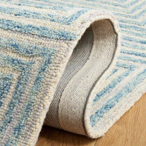 Safavieh Light Blue & Ivory Hand Tufted Geometric Motif Area Rug 5 Safavieh Light Blue & Ivory Hand Tufted Geometric Motif Area Rug - Image 5