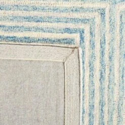 Safavieh Light Blue & Ivory Hand Tufted Geometric Motif Area Rug 15 Safavieh Light Blue & Ivory Hand Tufted Geometric Motif Area Rug -Famous Furniture Store light blue and ivory hand tufted geometric motif area rug rugs the well appointed house 6