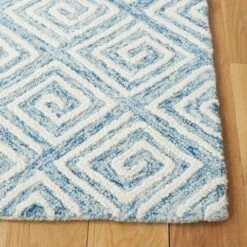 Safavieh Light Blue & Ivory Hand Tufted Greek Key Motif Area Rug 11 Safavieh Light Blue & Ivory Hand Tufted Greek Key Motif Area Rug -Famous Furniture Store light blue and ivory hand tufted greek key motif area rug rugs the well appointed house 4